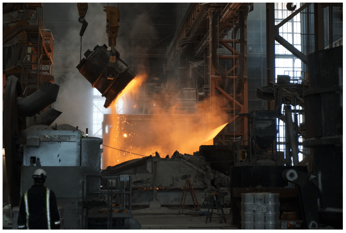 a factory with smoke coming out of it