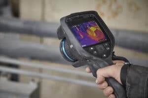 Thermal inspection being performed with a portable FLIR camera